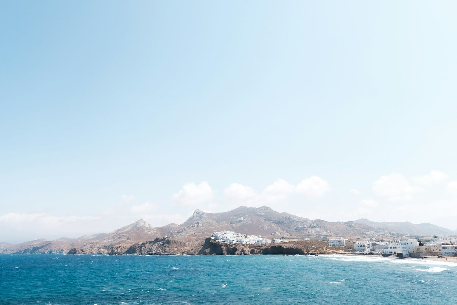 Naxos, Greece under a blue sky and surrounded by the Aegean Sea