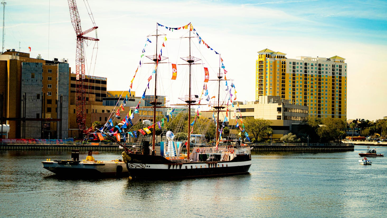 Colorful boat on calm water near Tampa Cruise Port on a sunny day