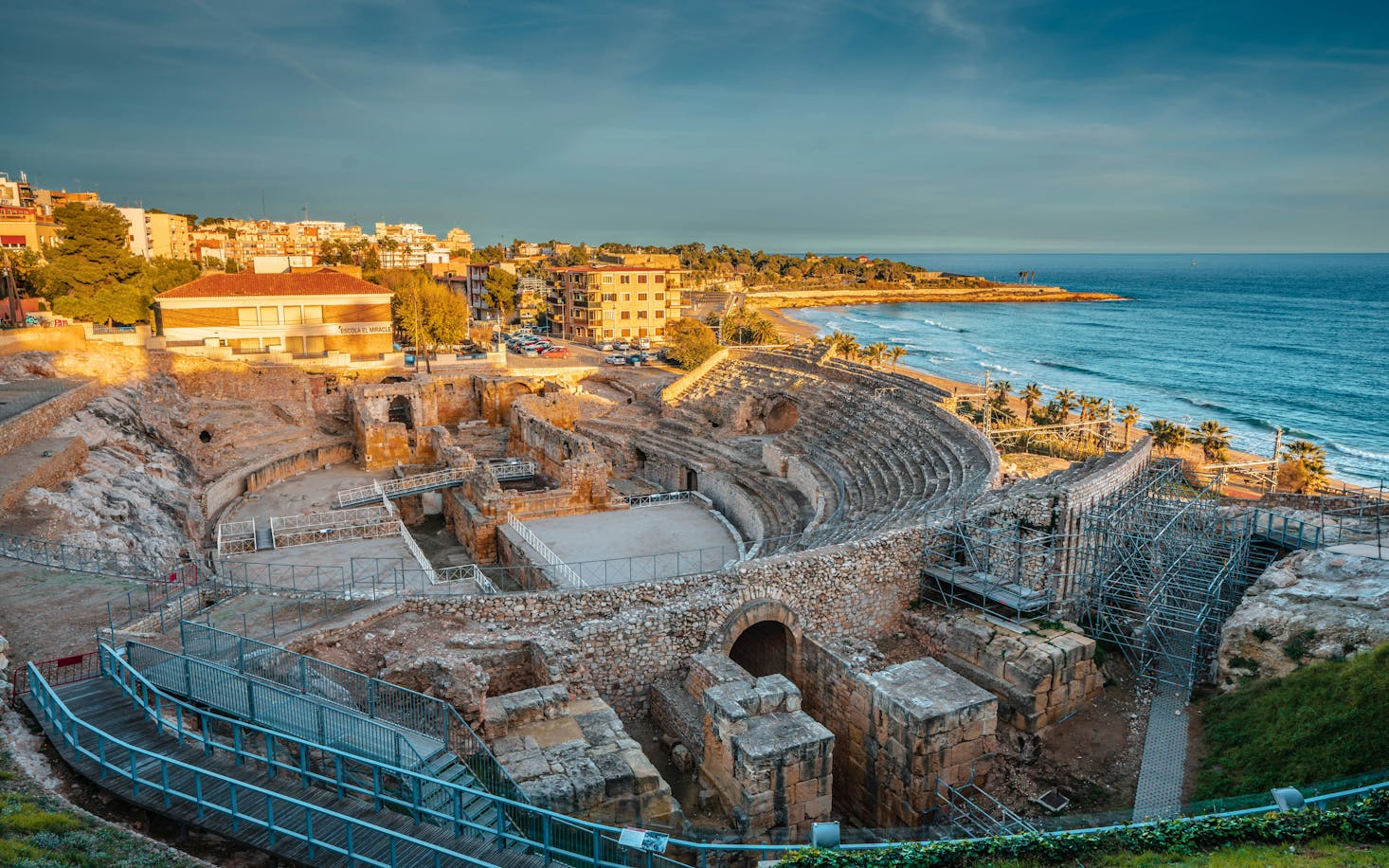 Filtered sunlight on a Roman amphitheater on the coast near Estación de Tarragona Station