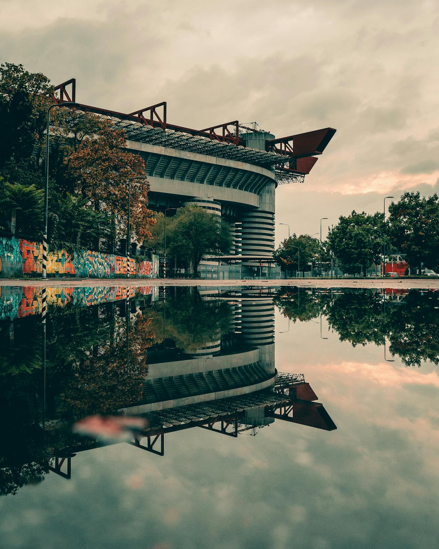 Stadium on a cloudy day with bright-colored graffiti in San Siro, Milan