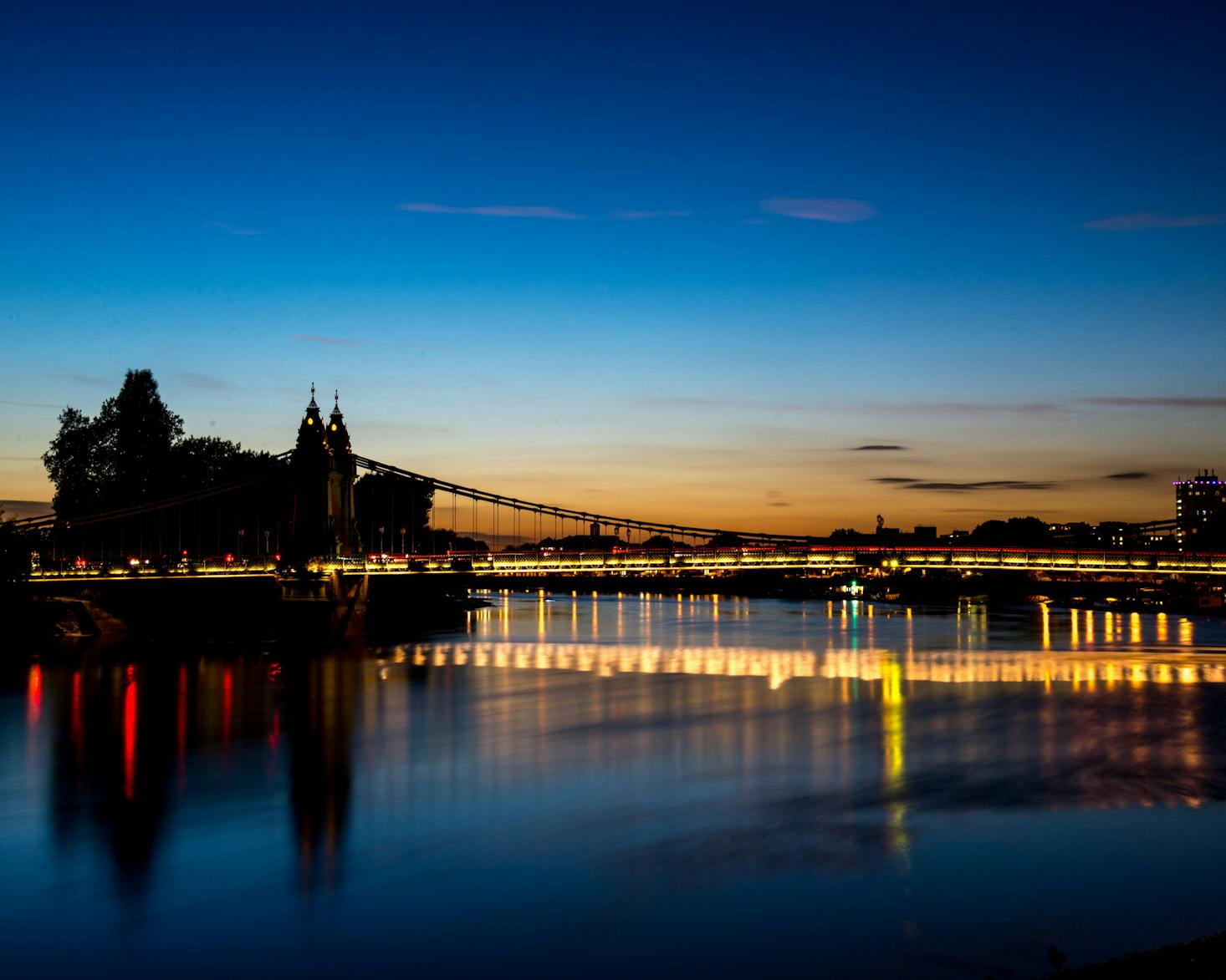 The Hammersmith Bridge in London at sunset