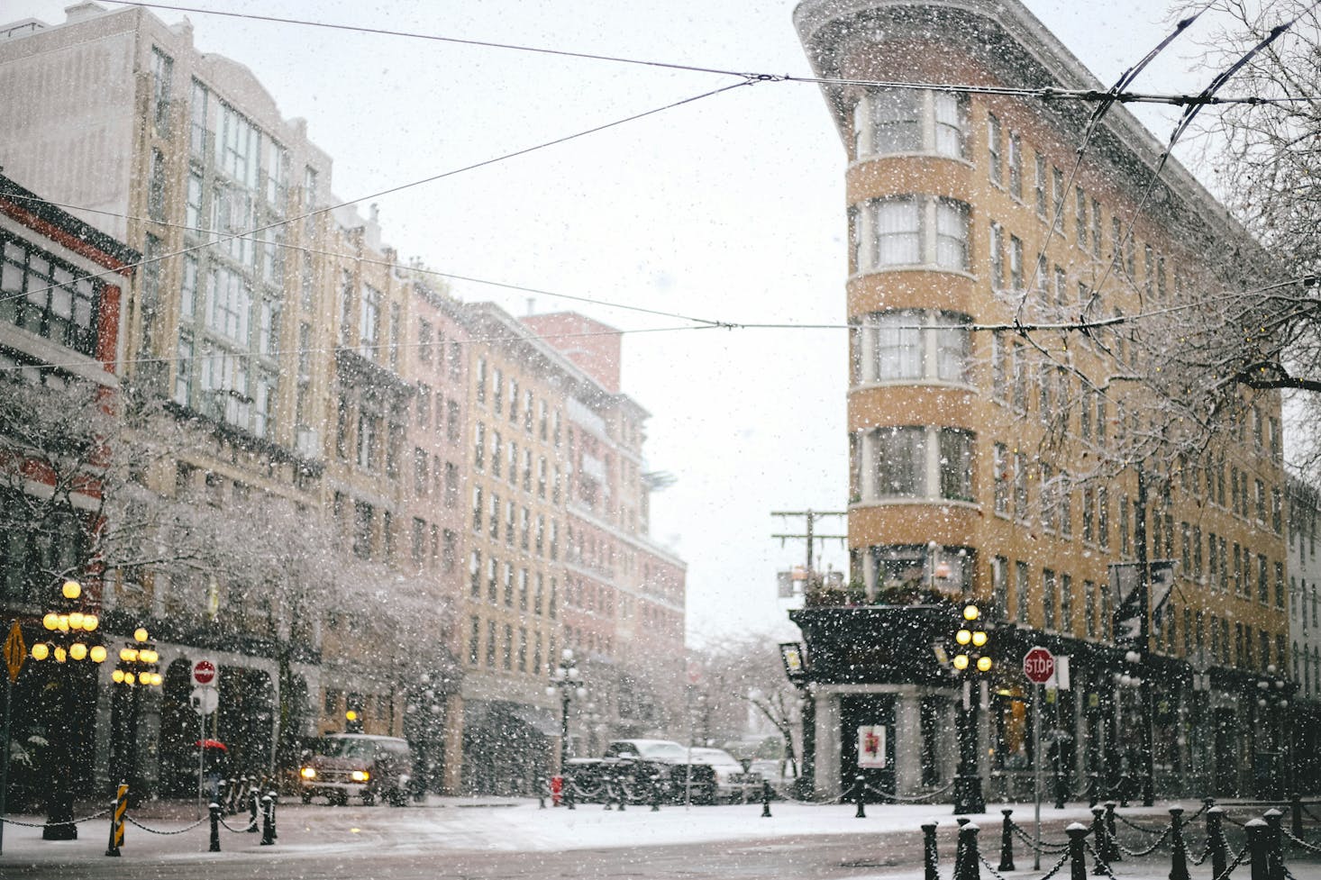 Brown historic buildings in Vancouver's Gastown on a snowy day