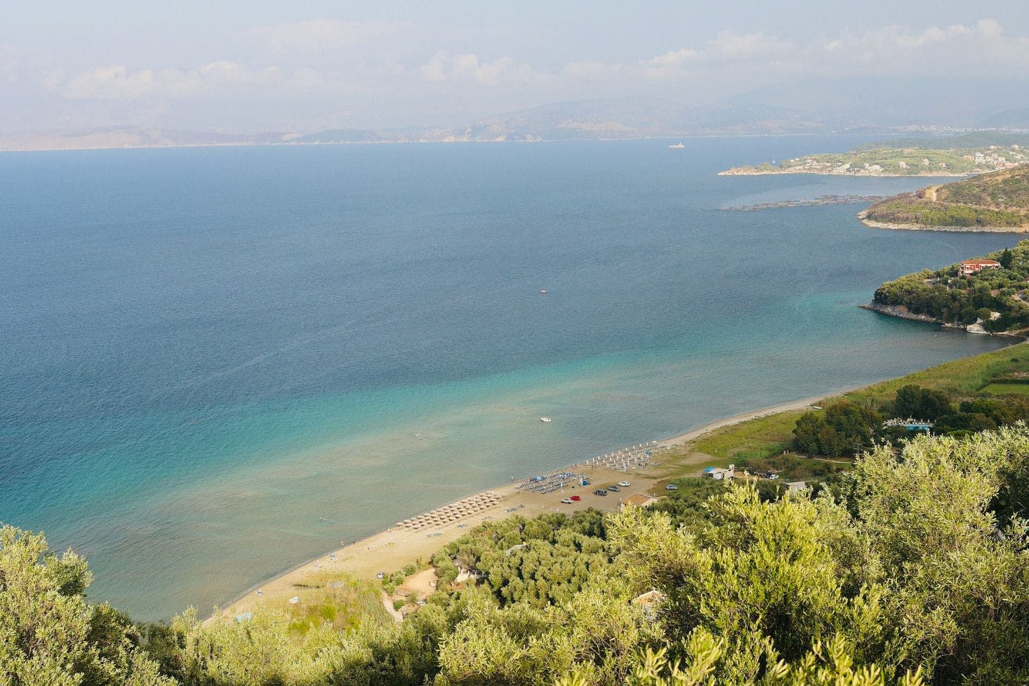 Top-view of sandy Kalamaki Beach and  surrounding greenery