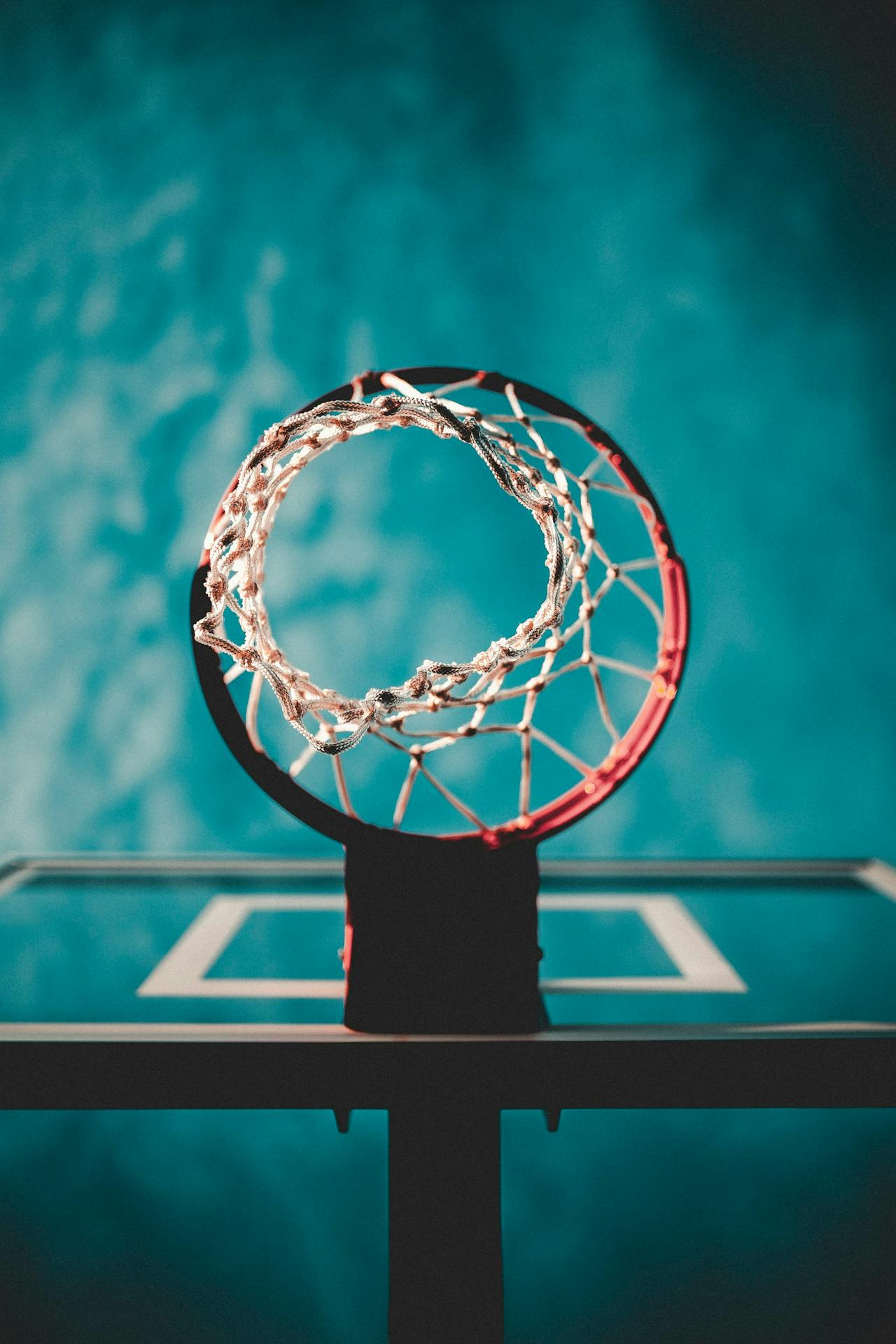 Low angle shot of an indoor basketball hoop