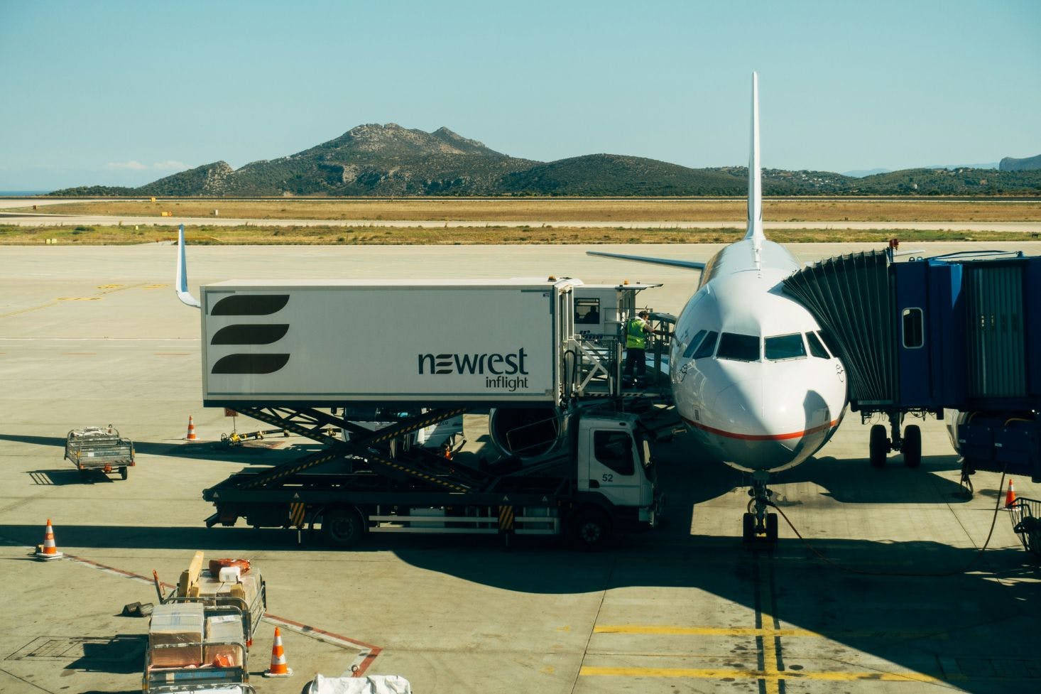 Plane connected to the Athens airport by a jet bridge