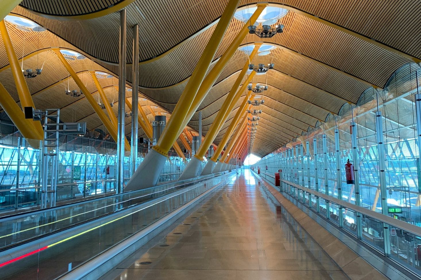 View of the hallway in the Madrid Barajas Airport terminal with wavy ceilings