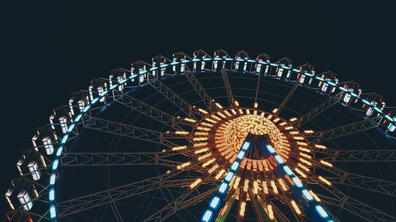 Low angle shot of a huge lighted Ferris wheel in Berlin