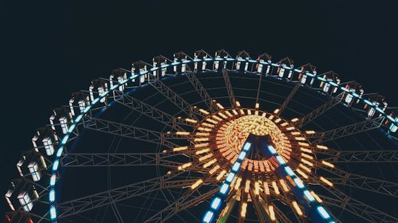 Low angle shot of a huge lighted Ferris wheel in Berlin