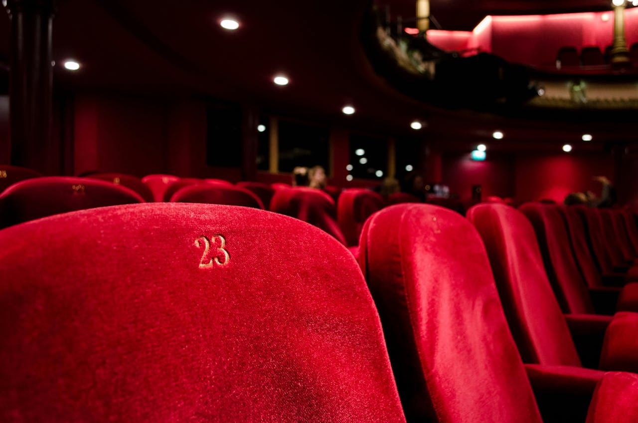 Red cinema seat with the number 23 on it