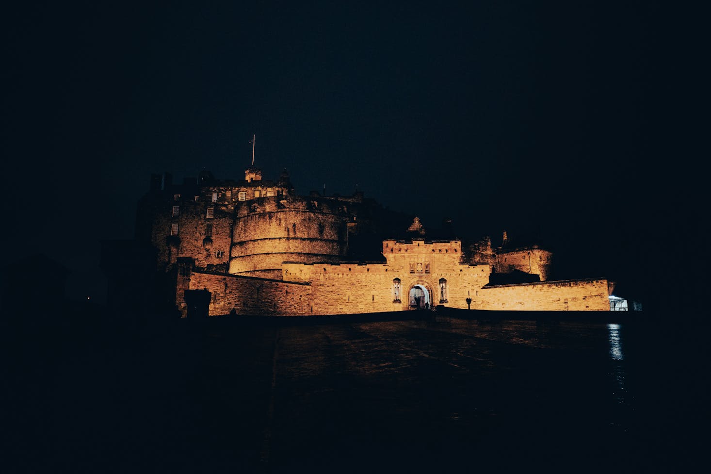 Edinburgh Castle emerging from complete darkness