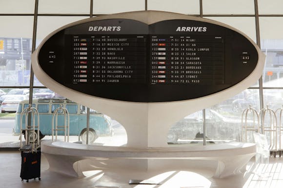 Futuristic robot-shaped departure-arrival board at JFK Airport in New York