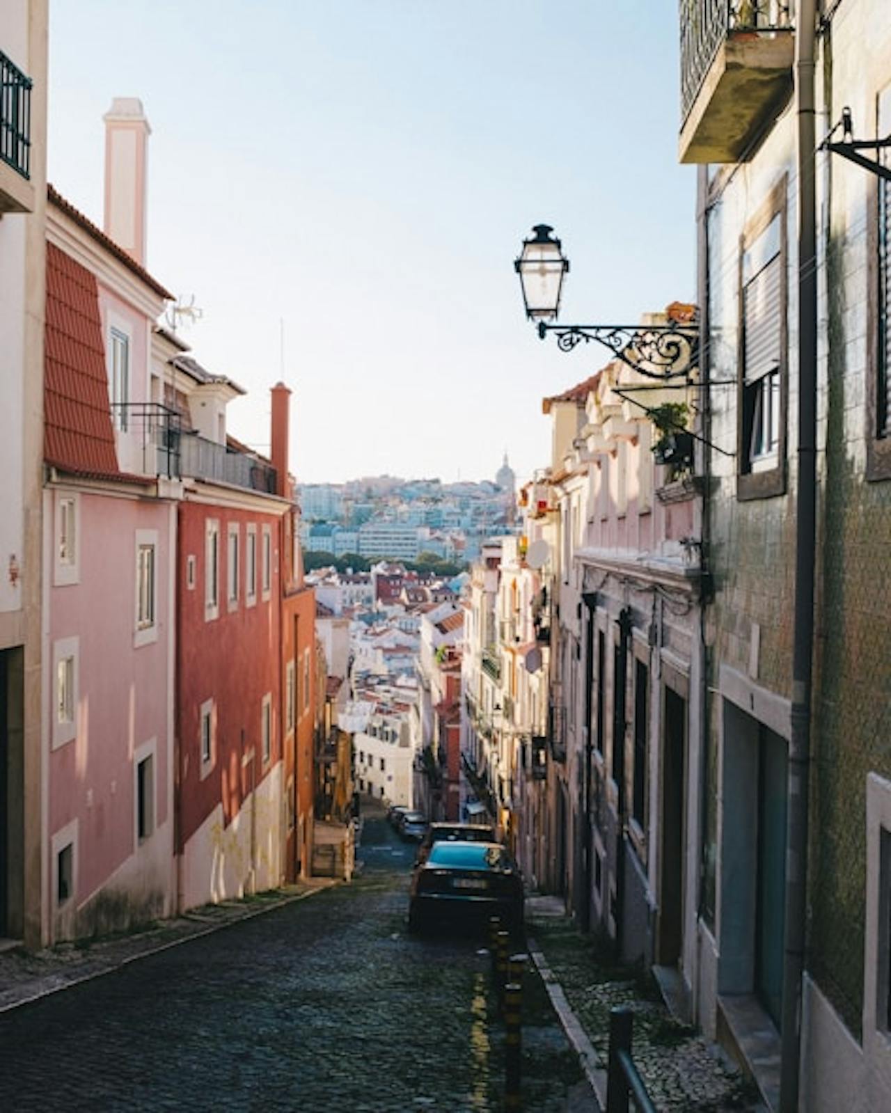 Narrow downhill street in Lisbon