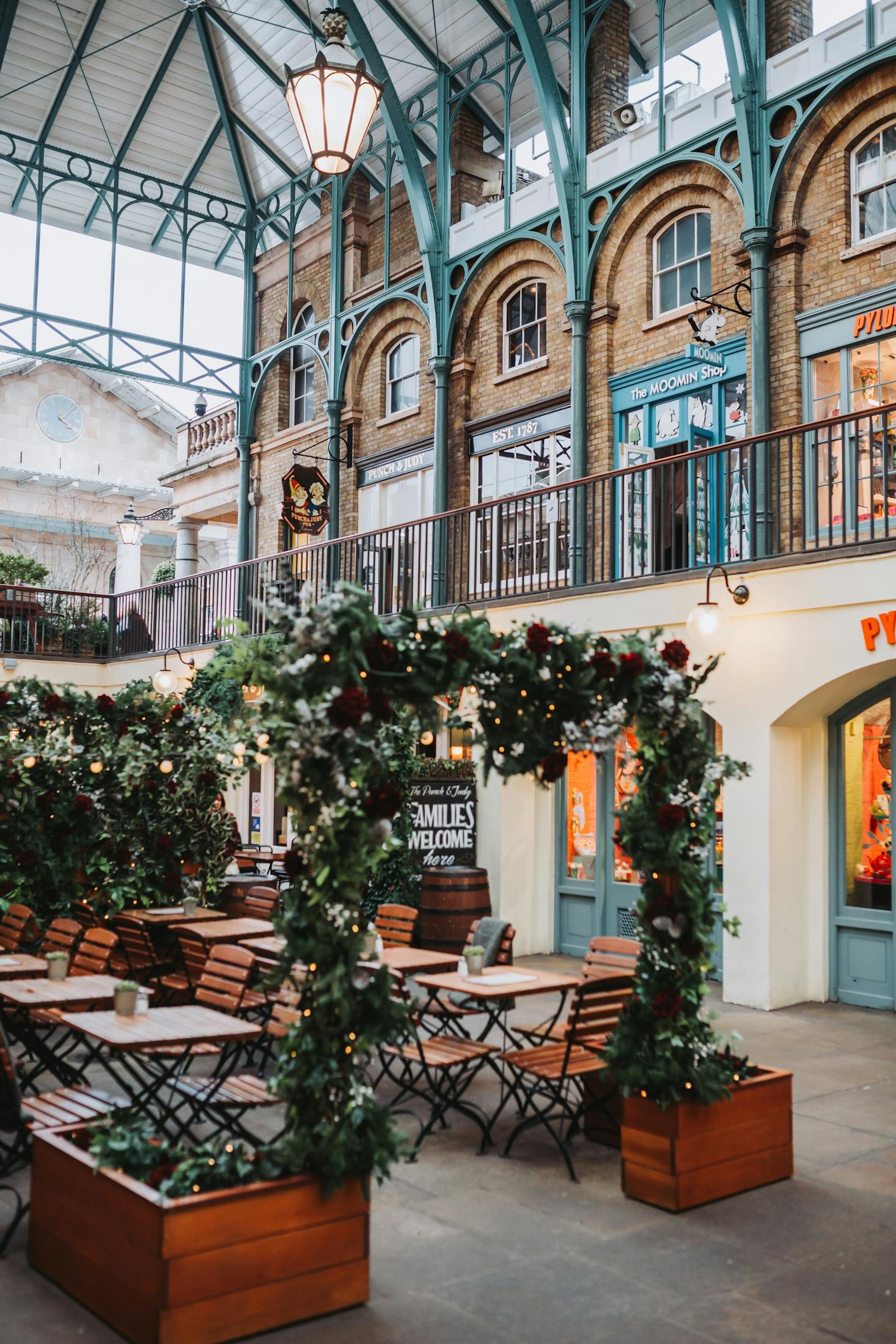 Tables and chairs set up inside Covent Garden Market