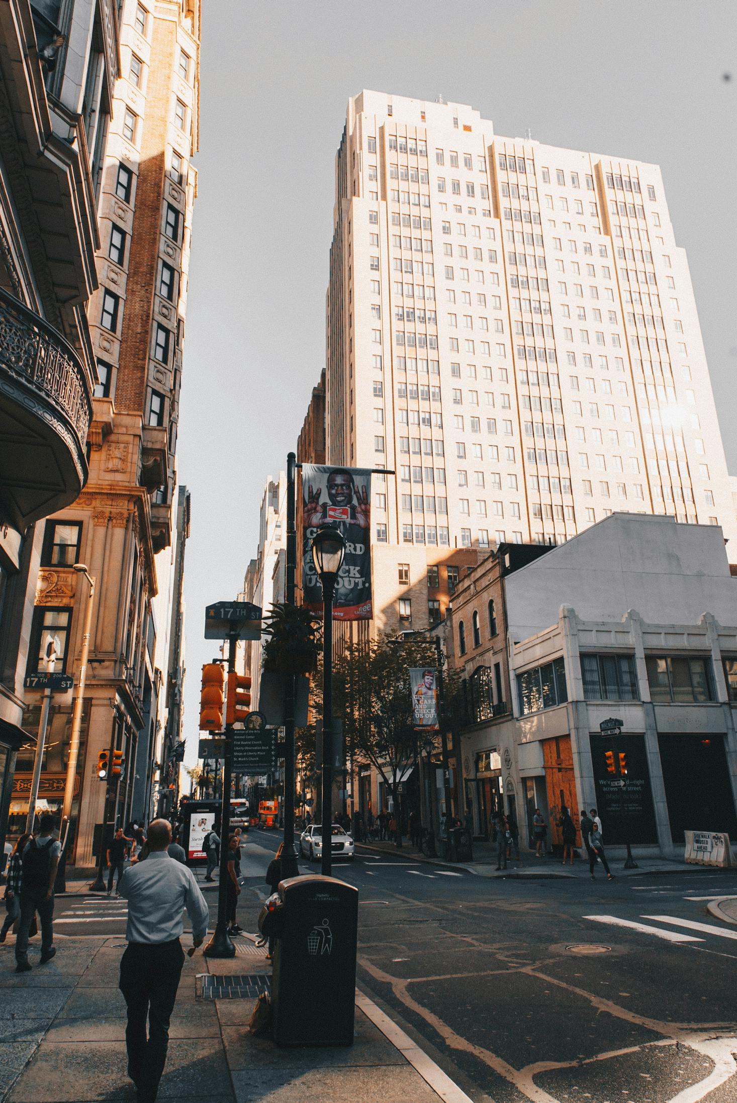 A person walking in Philadelphia during the day