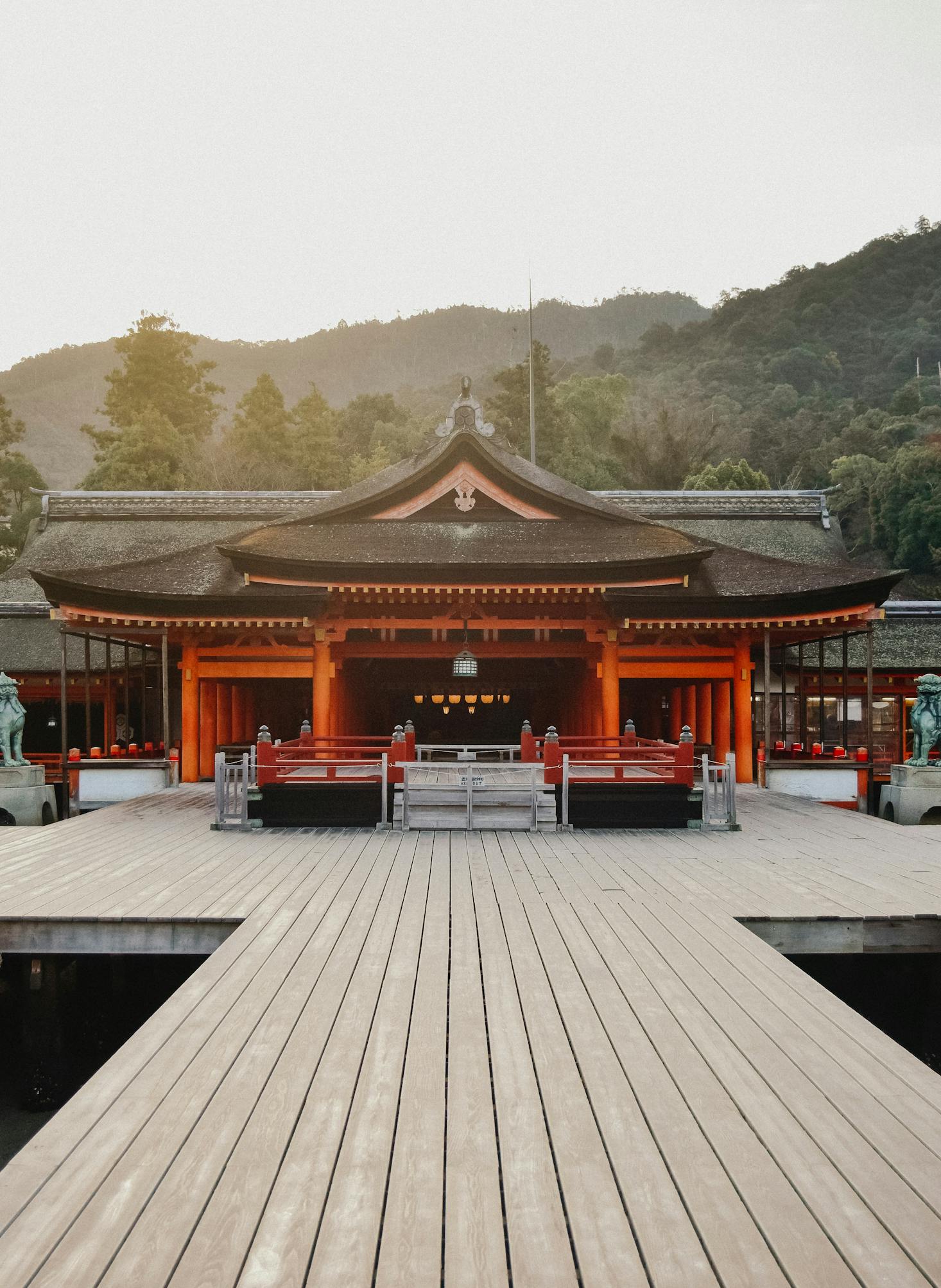 A temple in Hiroshima is surrounded by mountains