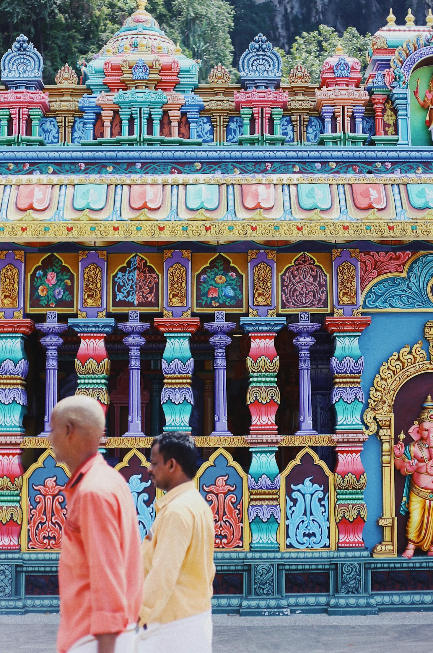 An ornately-painted building in pastel colors near Batu Caves in Malaysia