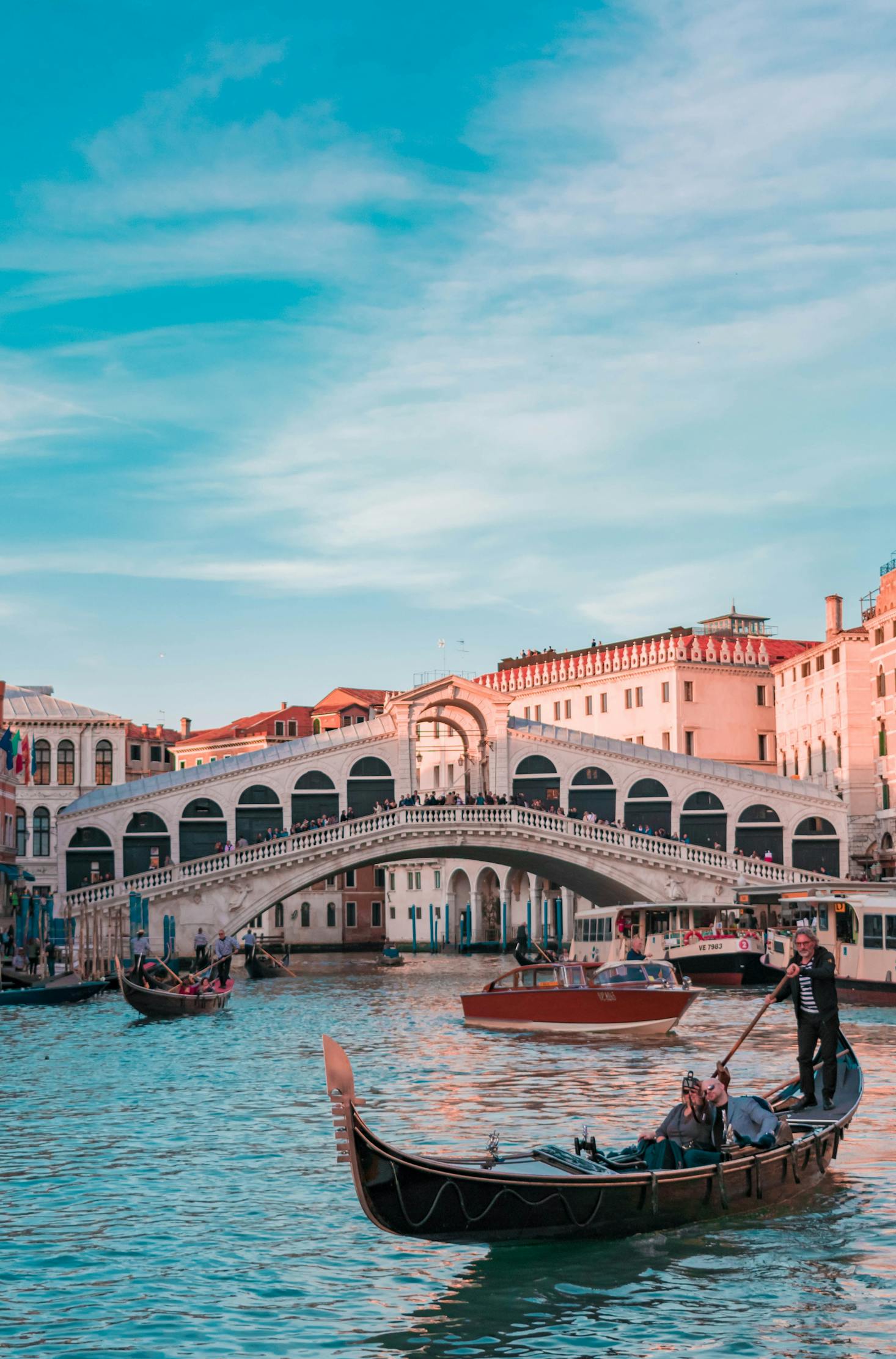 View of the white Rialto Bridge from the water in Venice near Piazzale Roma