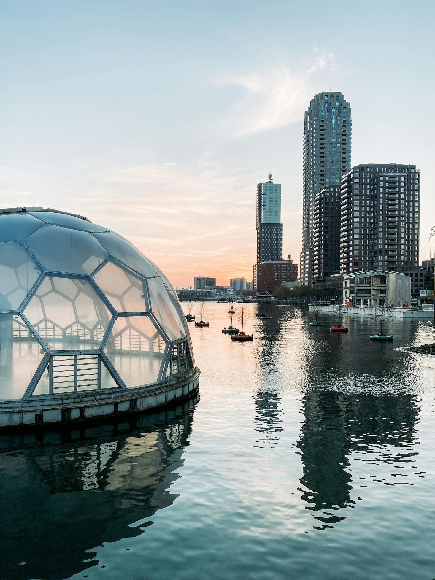 The harbor in Rotterdam, Netherlands with highrises in the background