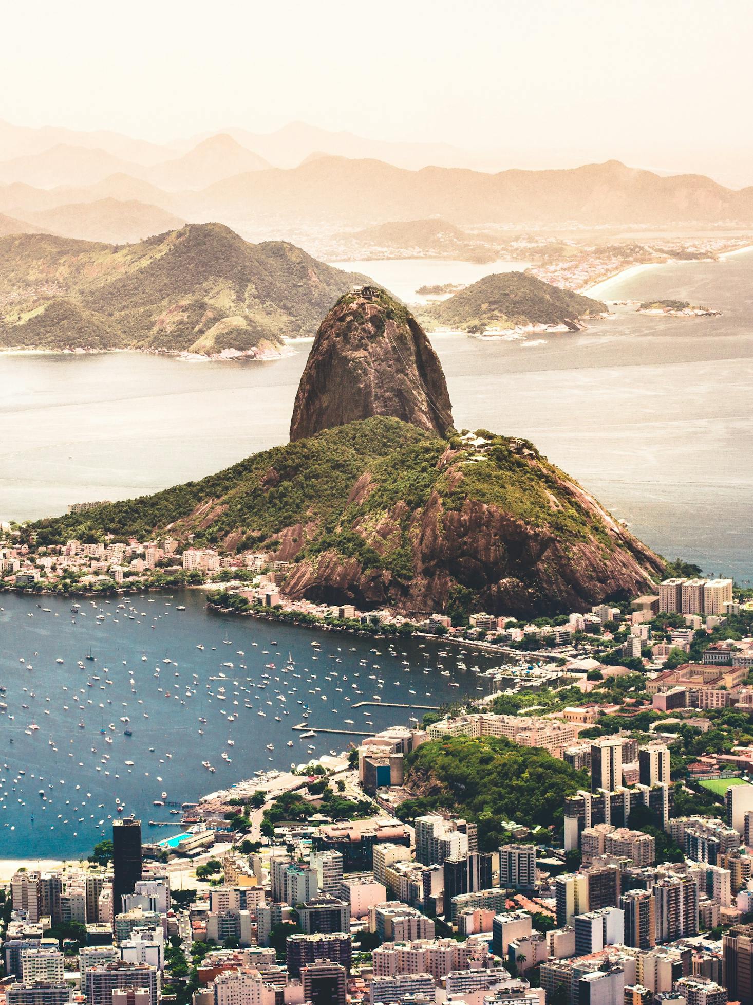 The city of Rio de Janeiro, Brazil flanked by Sugarloaf Mountain