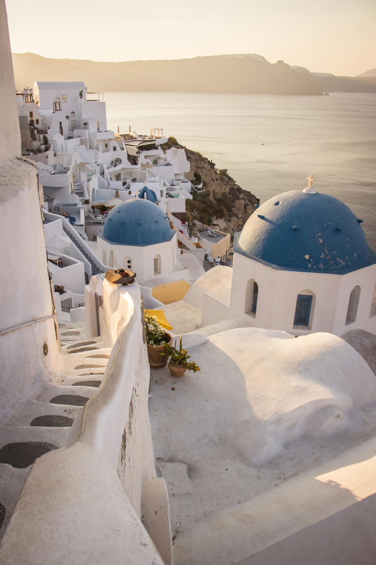 In Mykonos, Greece, white homes line the shore side In Mykonos, Greece, white homes line the shore side