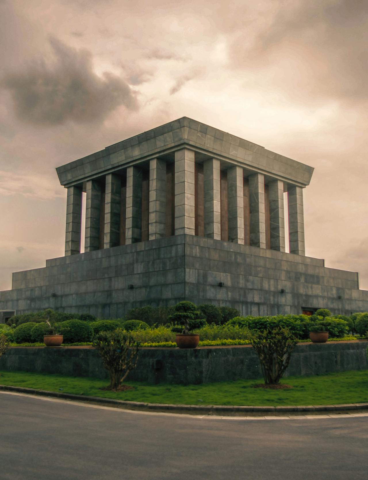 Square monumental-type building against a gray cloudy sky in Hanoi Square monumental-type building against a gray cloudy sky in Hanoi