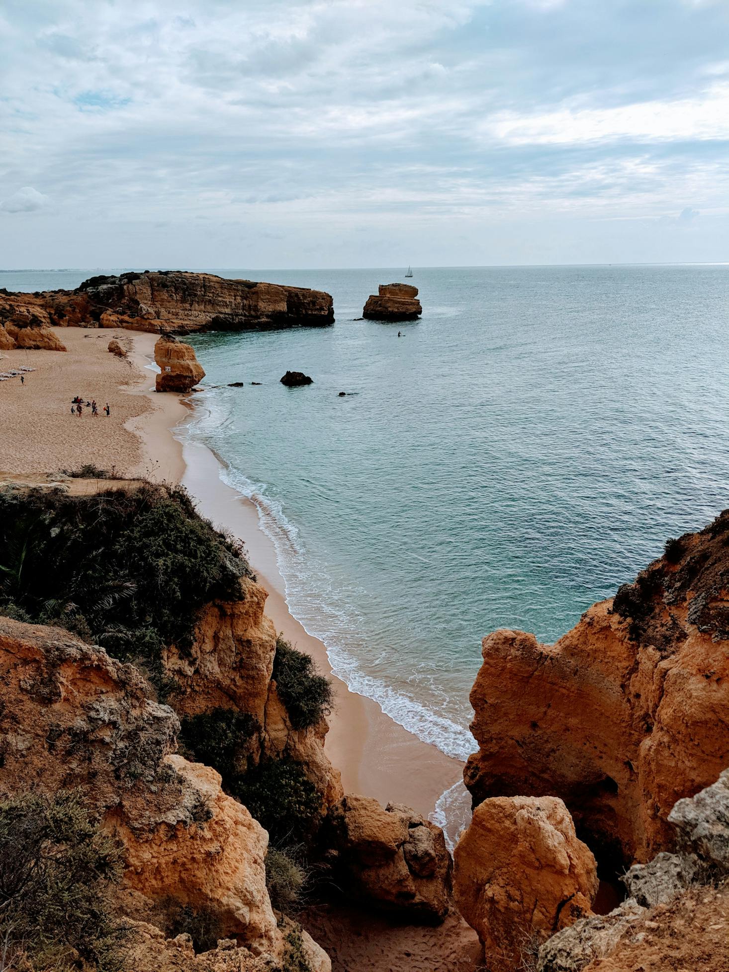 the rocks and sandy coastline of the beaches in Albufeira