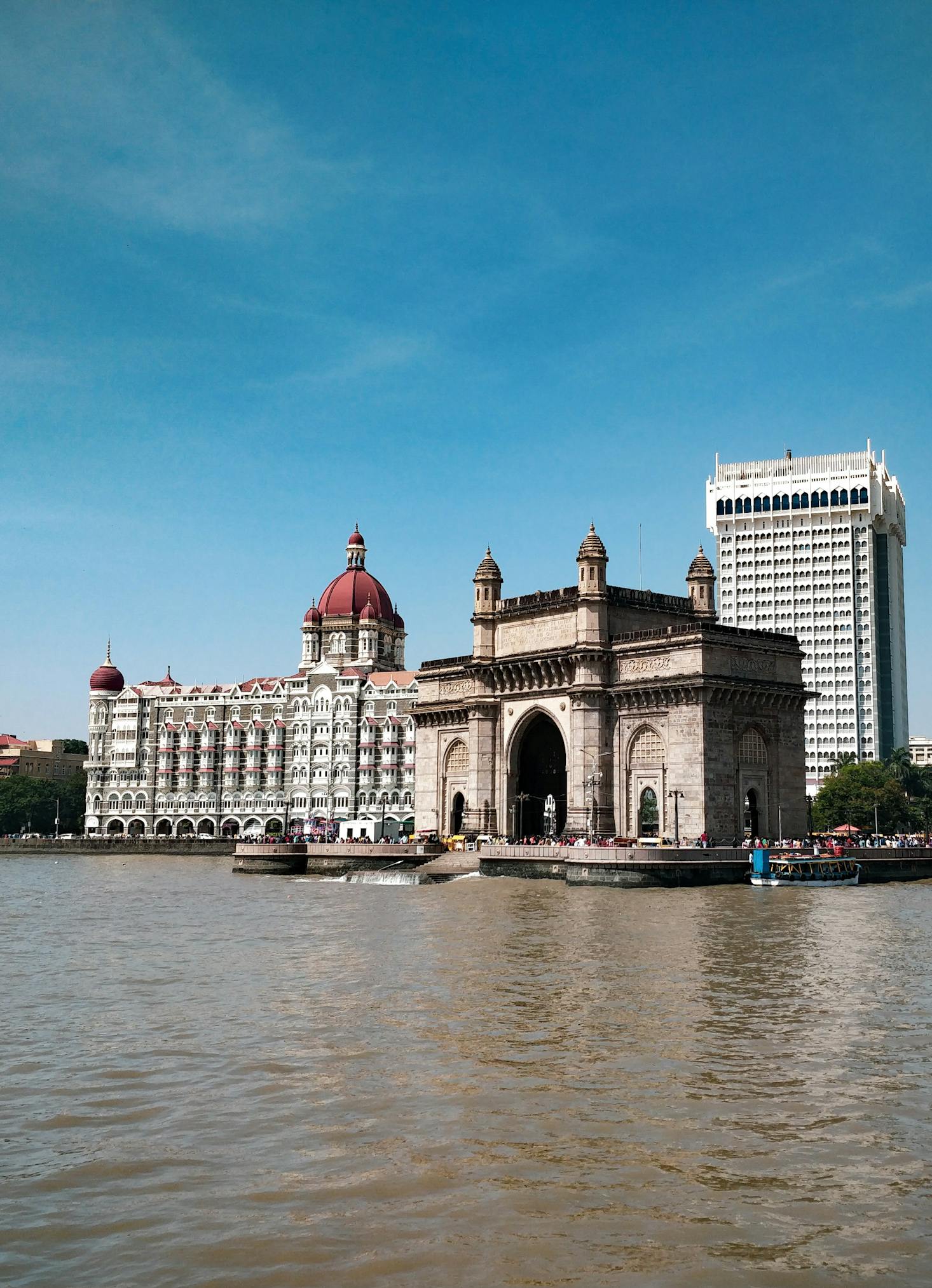 The Mumbai waterfront with historic buildings lining the shore