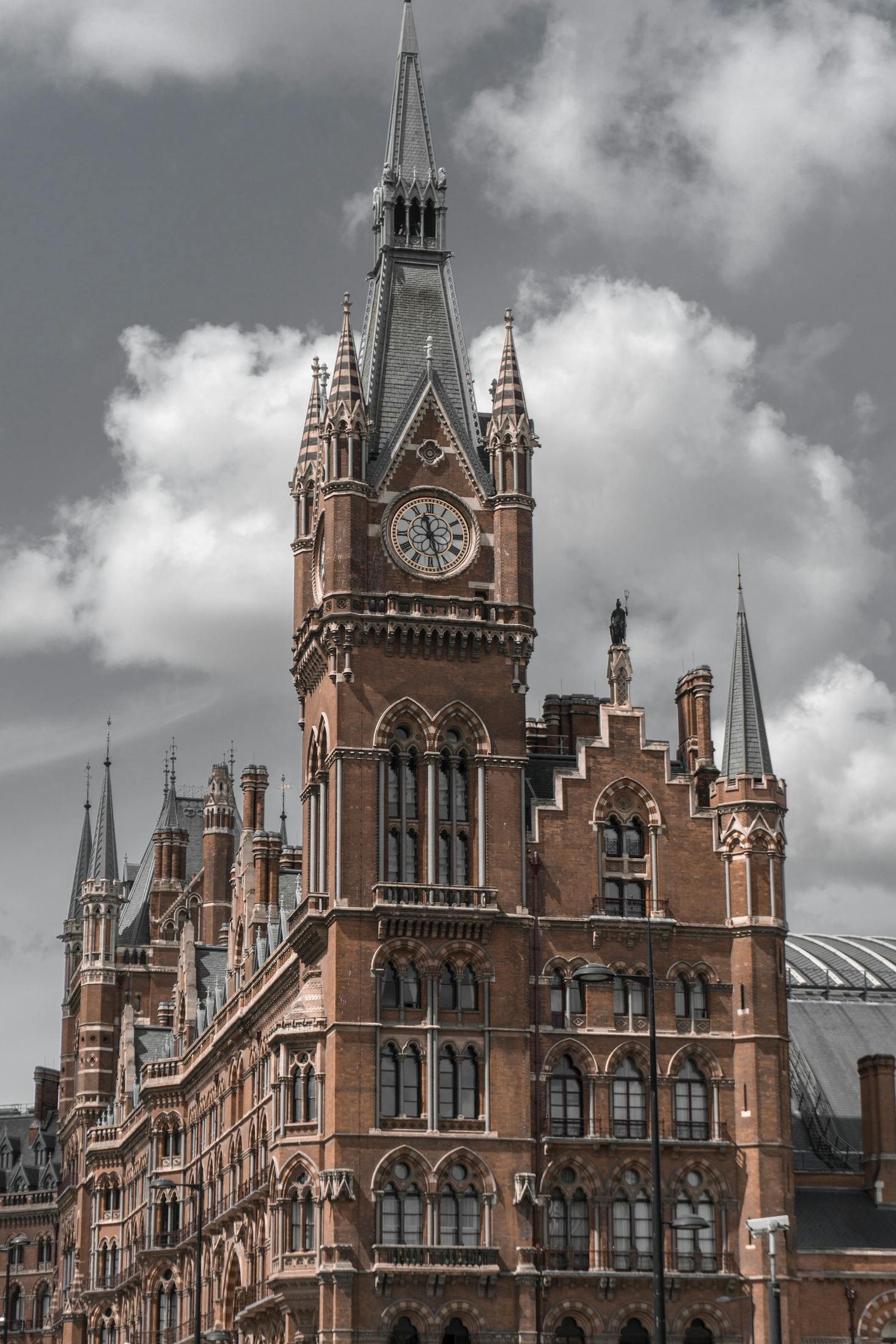 The clocktower and ornate building at St Pancras Station in London