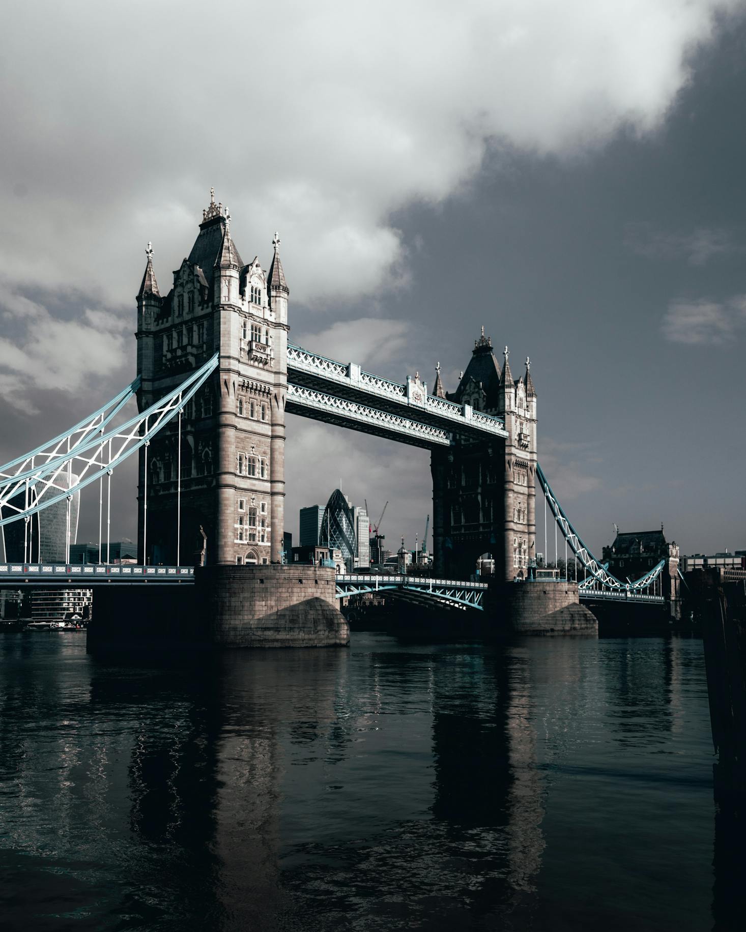 A moody view of London's Tower Bridge on a stormy day