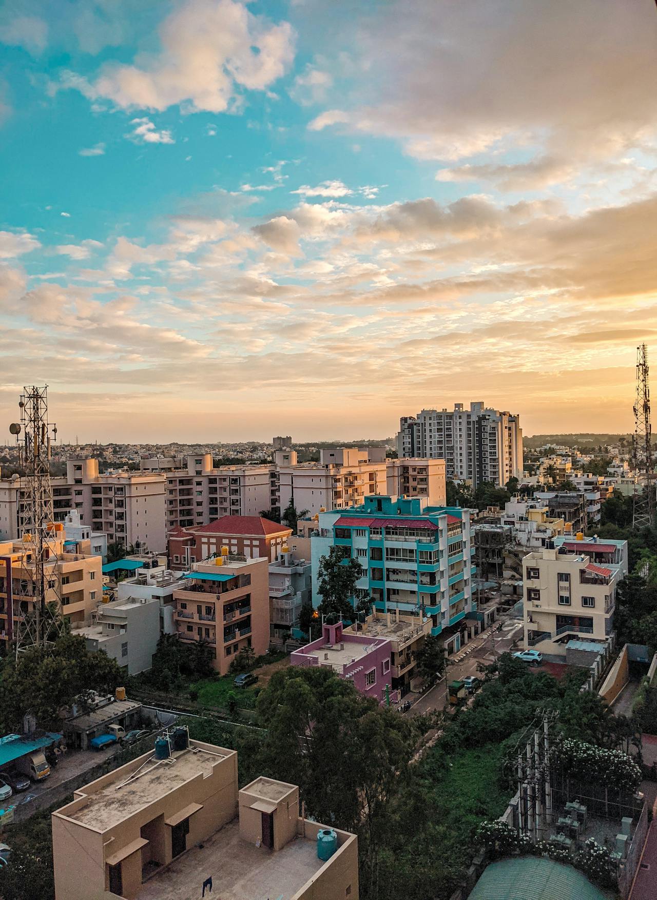Colorful buildings and highrises frame the cloudy sky in Bangalore, India Colorful buildings and highrises frame the cloudy sky in Bangalore, India