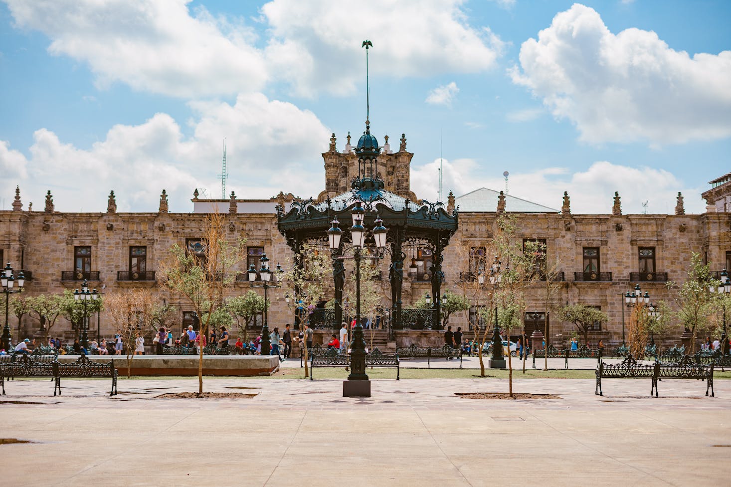 Plaza de Armas in Guadalajara with sun and clouds