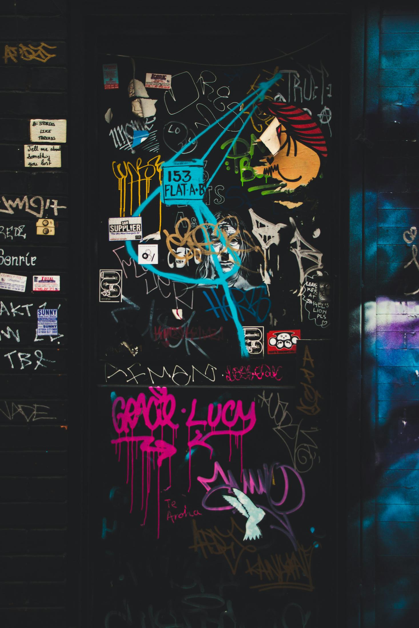 Colorful neon graffiti on a wall in London's Shoreditch neighborhood