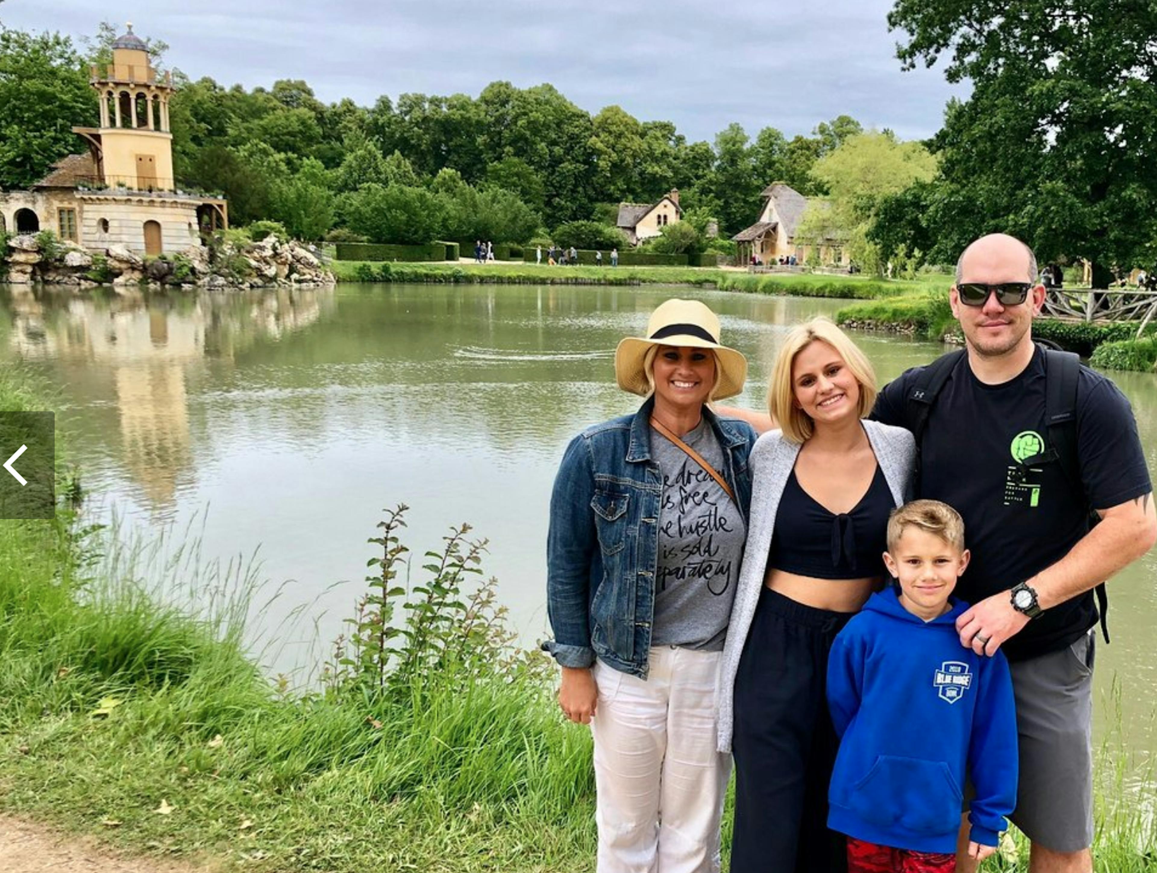 Family of four in Marie Antoinettes hamlet Versailles