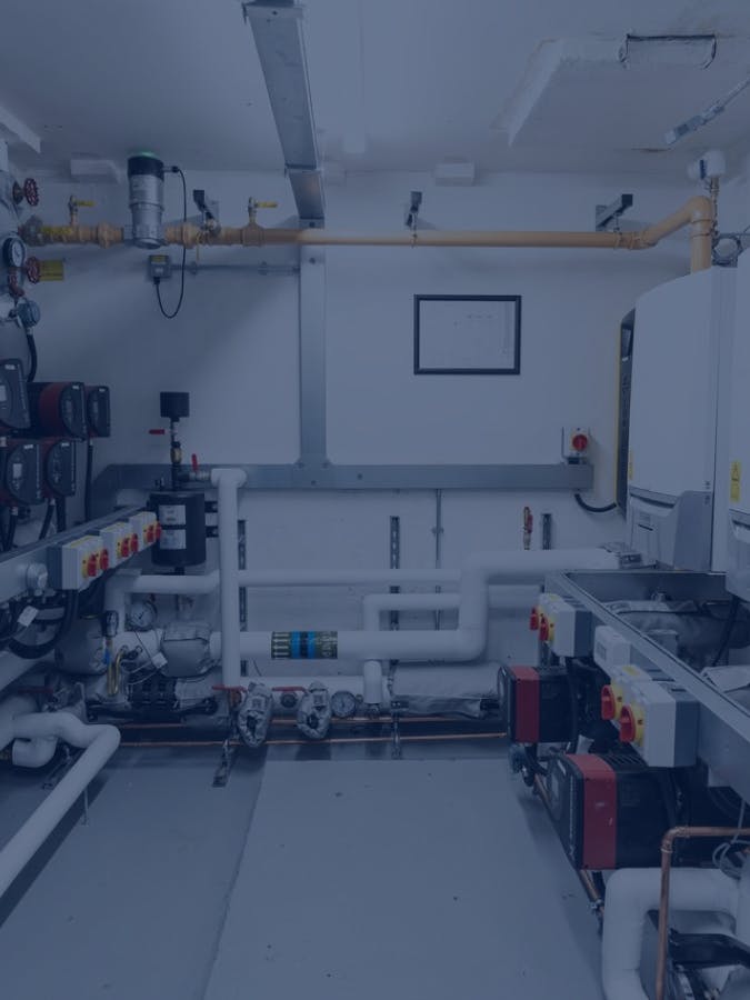 Refurbished plantroom with boilers and pipework