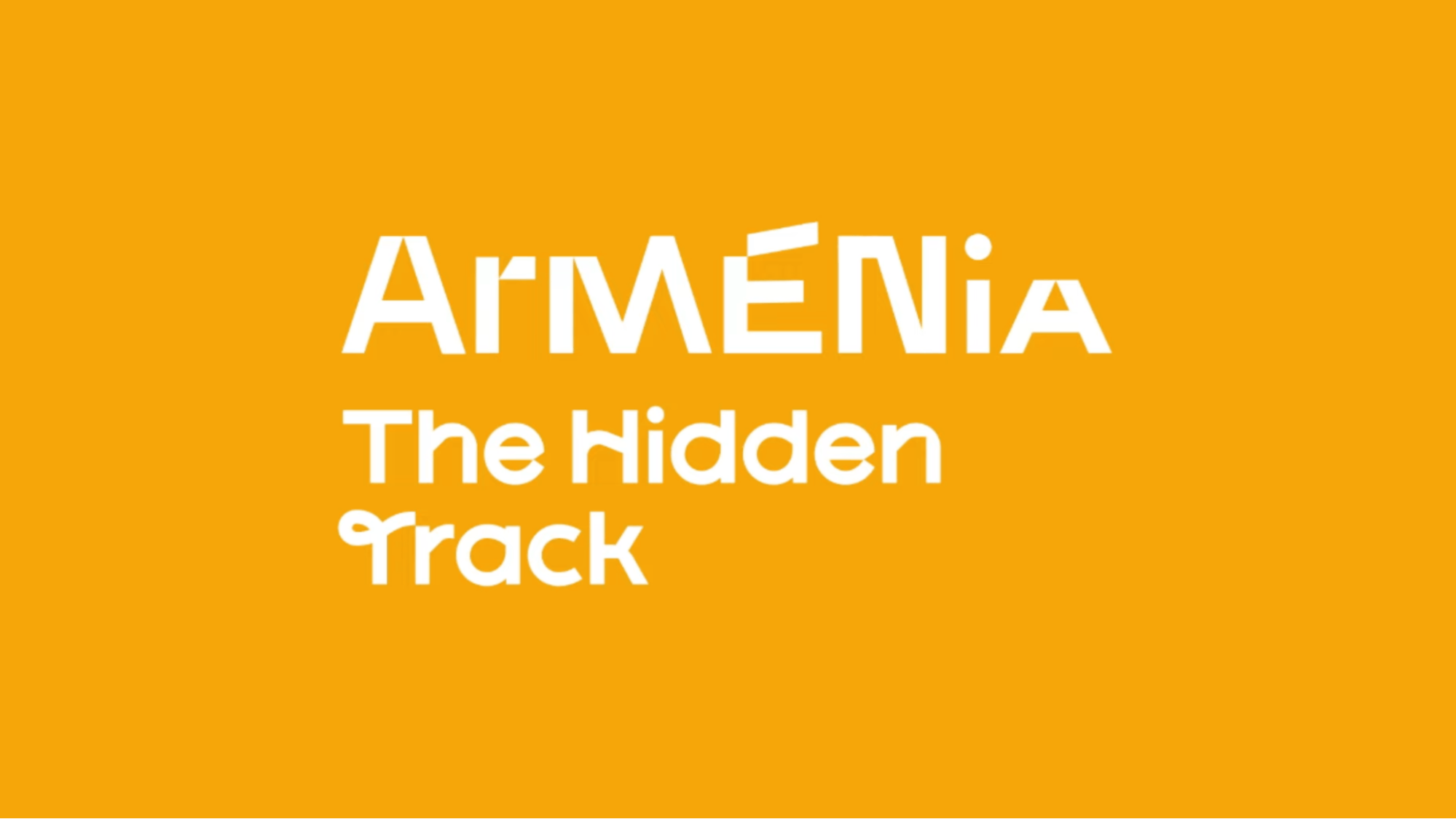 Destination Armenia’s wordmark on the brand’s main color: the Wild Apricot