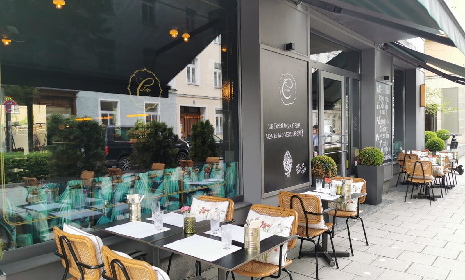 Set tables outside at Brasserie Colette by Tim Raue.