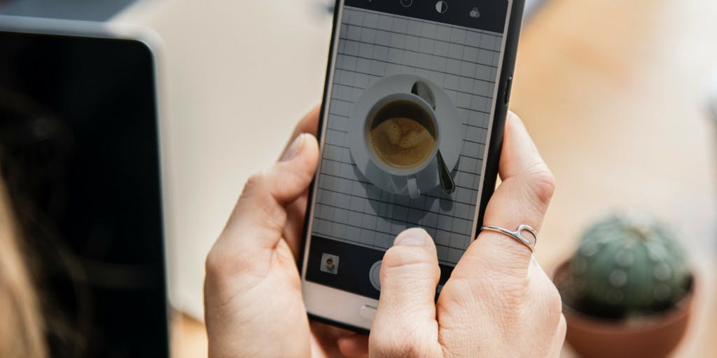 Taking a cute picture of your cappuccino