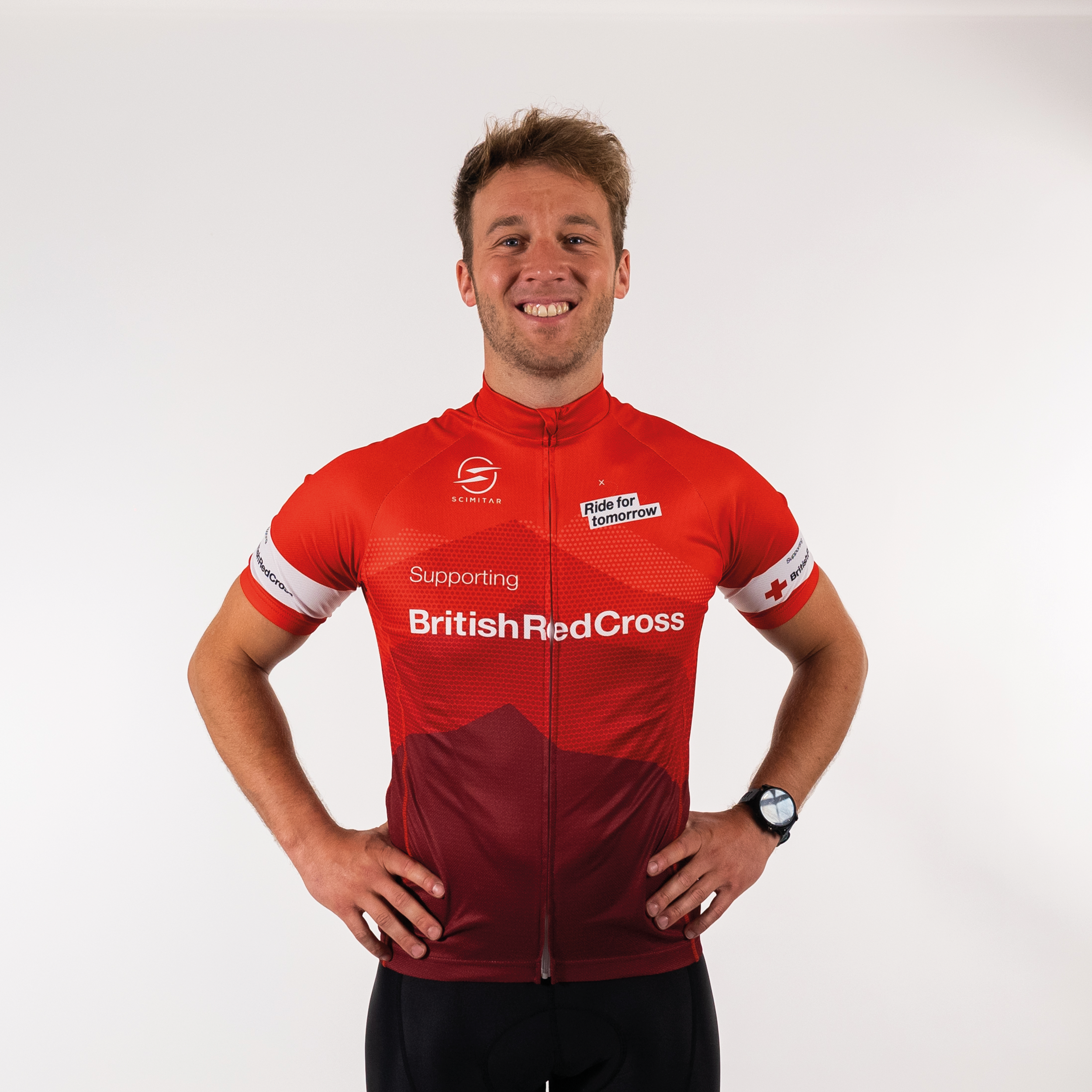 Model wearing red Ride for tomorrow jersey - unisex