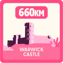 Illustration of Warwick Castle with a label reading ‘660 km’ above it, indicating distance.