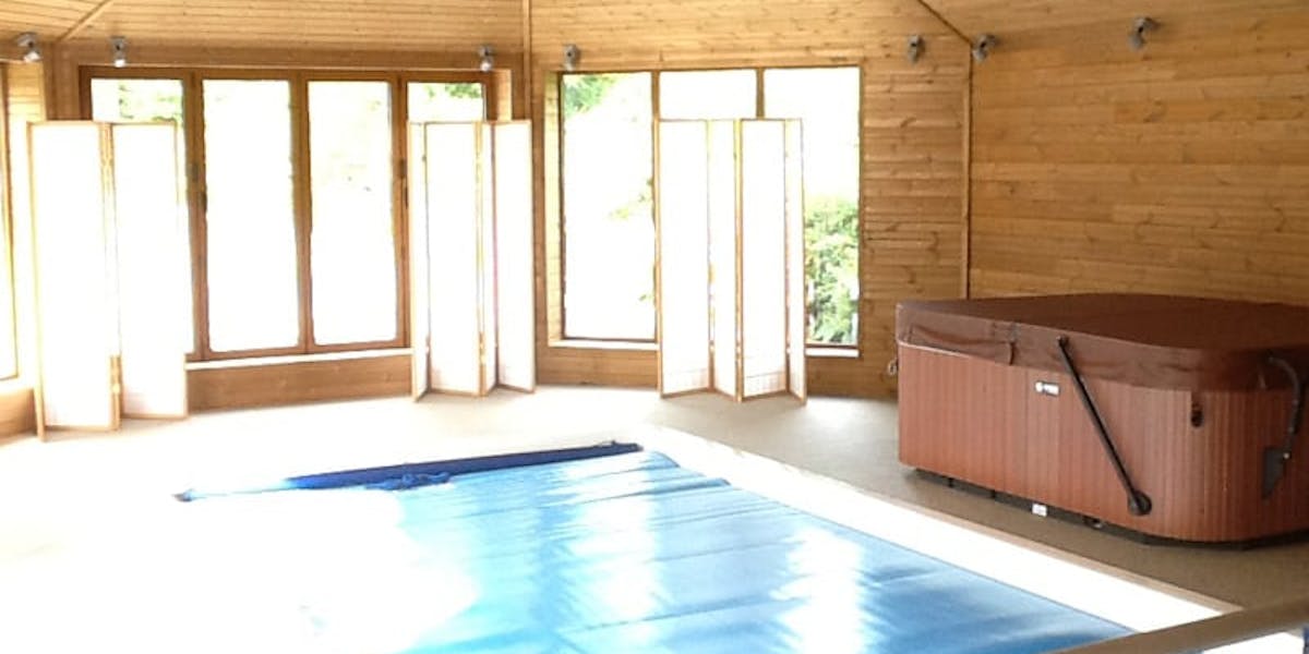 Pool house interior clad in Thermowood