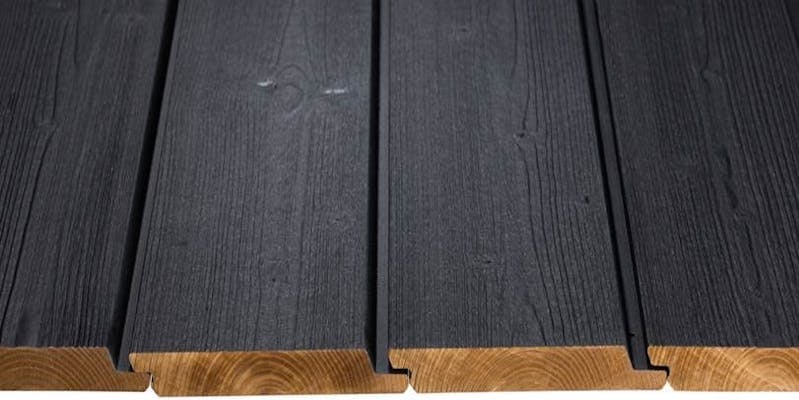 Black painted thermowood cladding