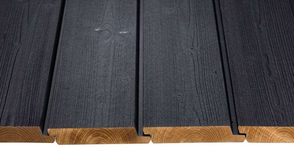 Black painted thermowood cladding
