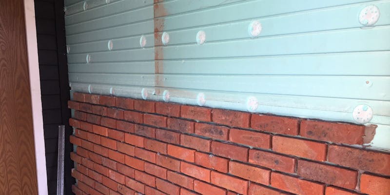 Red brick slip cladding using Candiwall on an internal structure detailing the thermal backing board