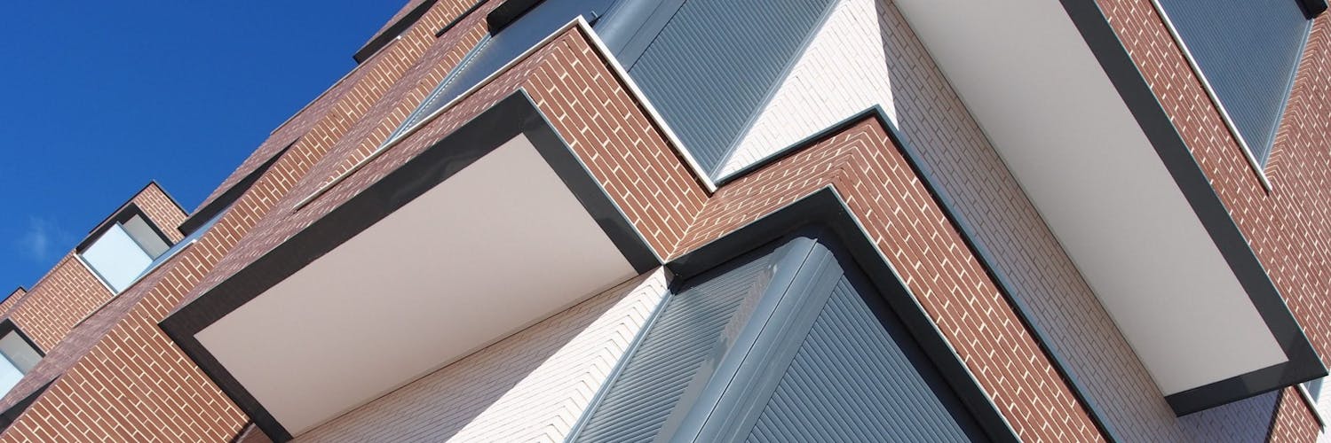 A modern building using Omega facing brick in Clay Brown