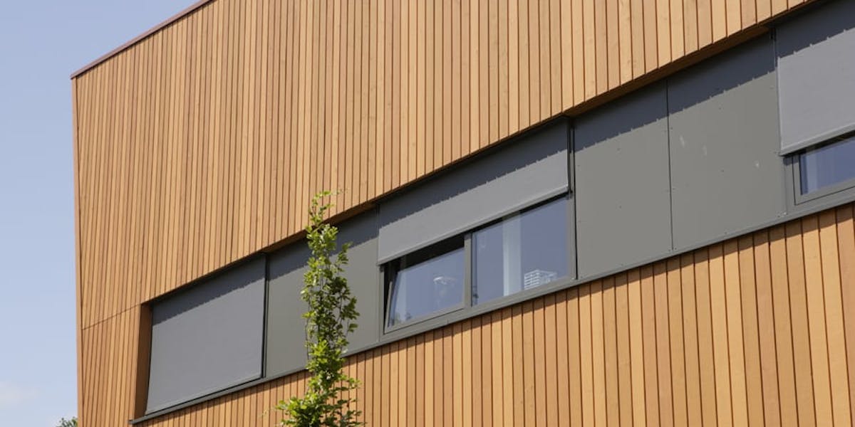 A commercial property clad in Cape Cod Pre-Painted timber cladding