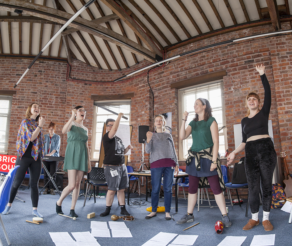 Anna Meredith rehearsing with musicians.