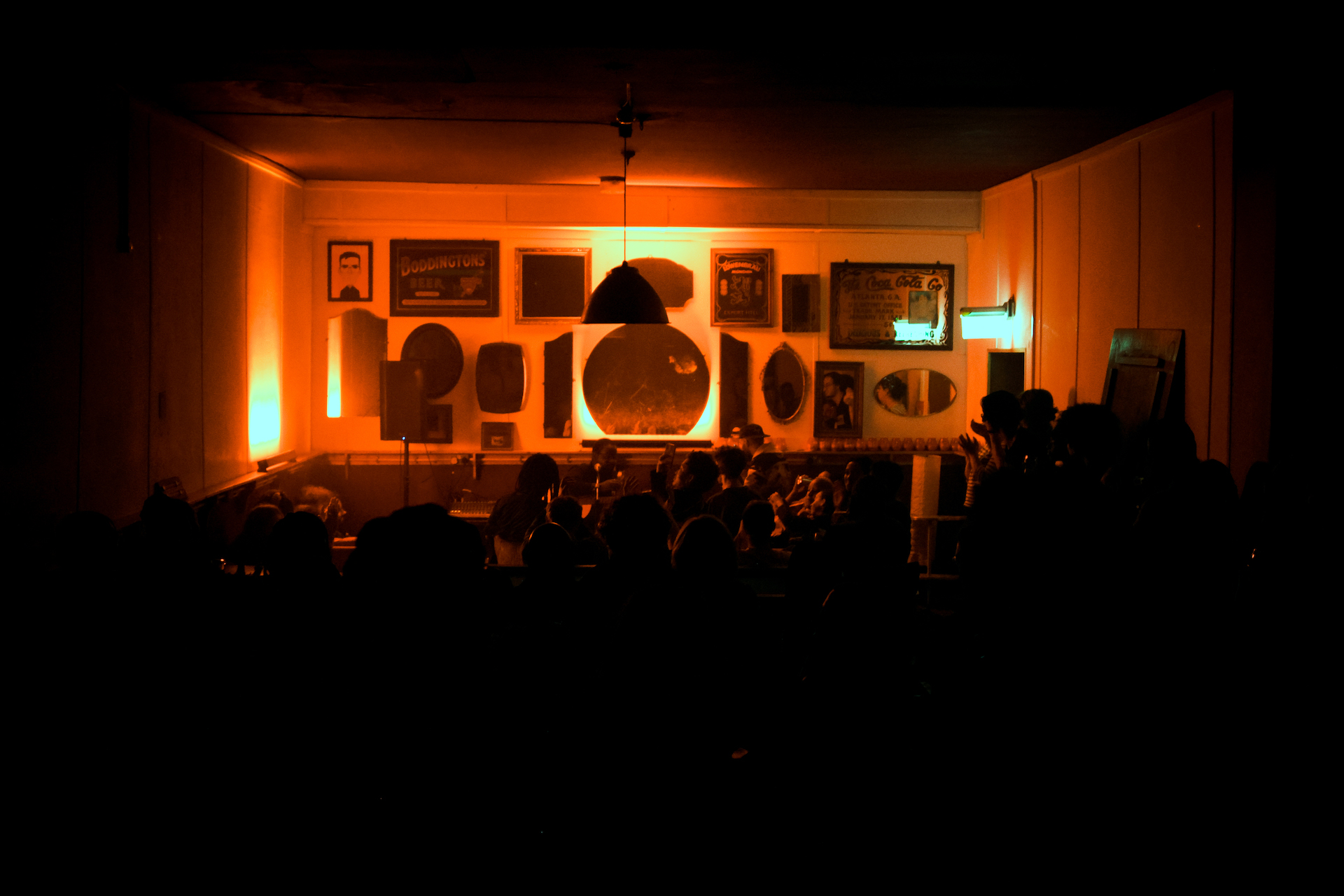 A wide shot of the crowd watching Daudi's performance.