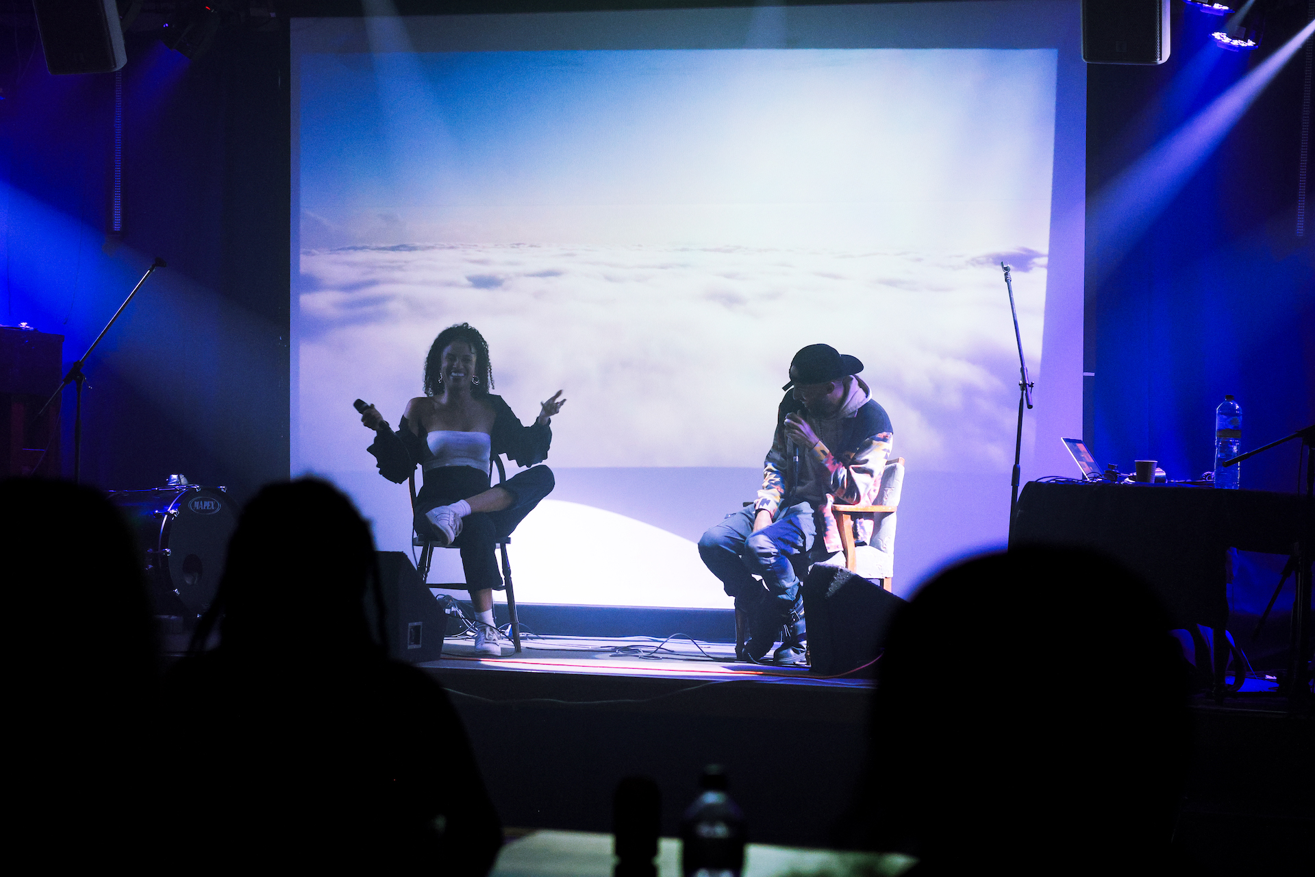 Mia Koden and Magic EKJ chatting on stage.
