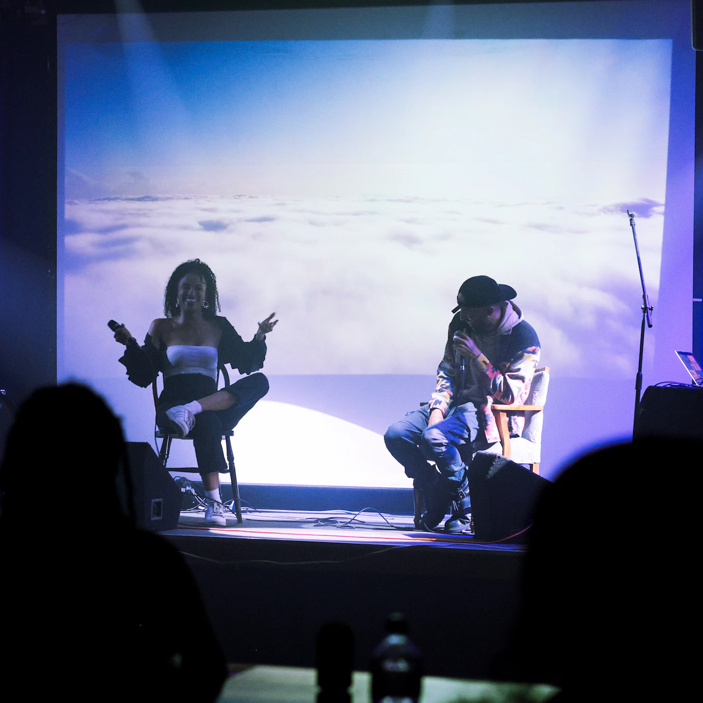 Mia Koden and Magic EKJ chatting on stage.