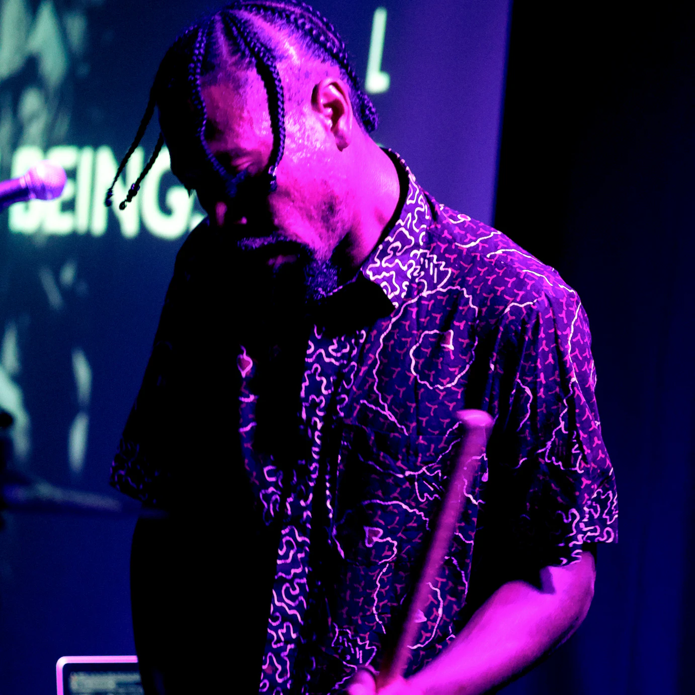 Obeka performing on drums.